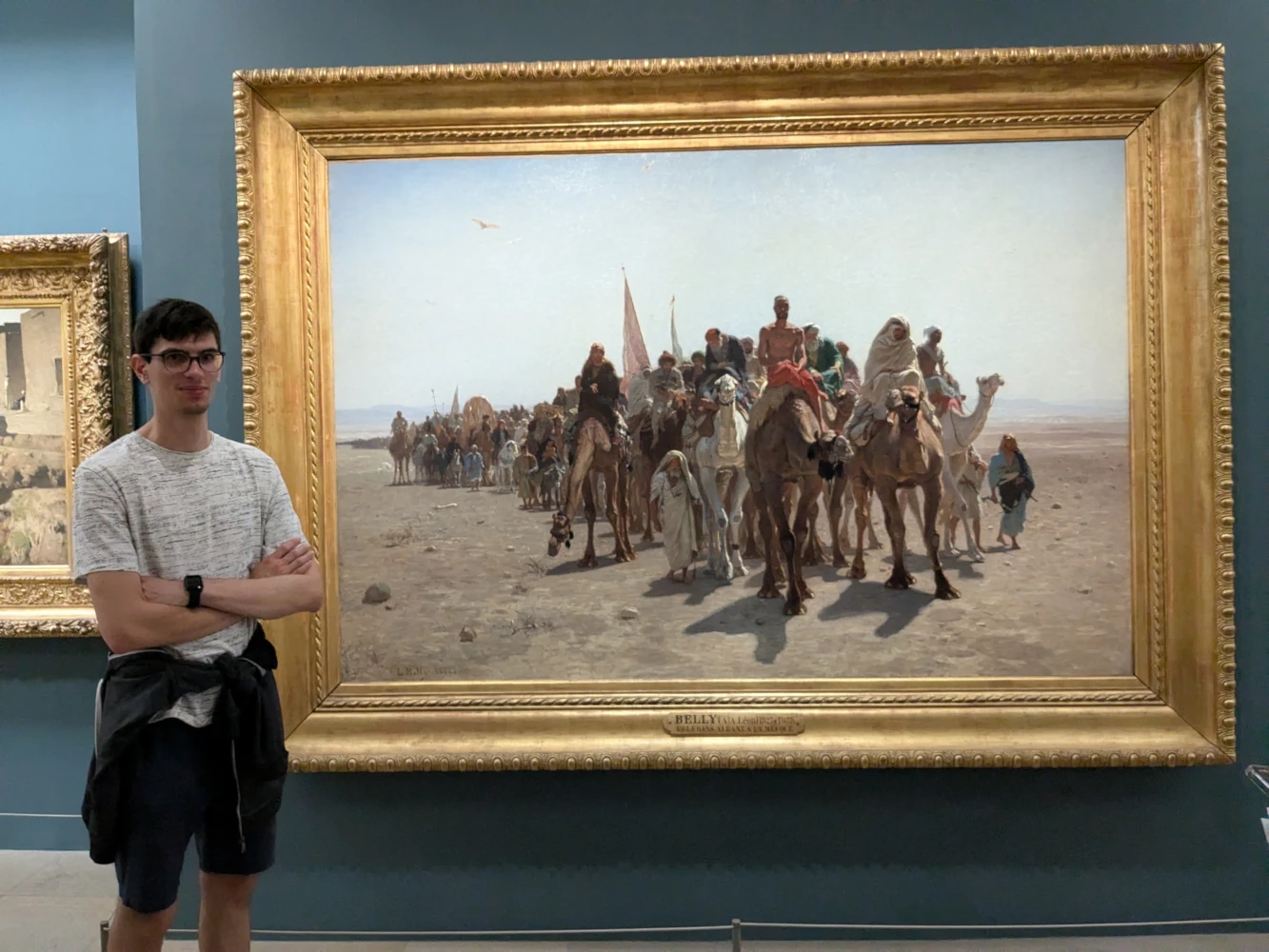 Photo of me with Léon Belly’s painting /Pilgrims going to Mecca/